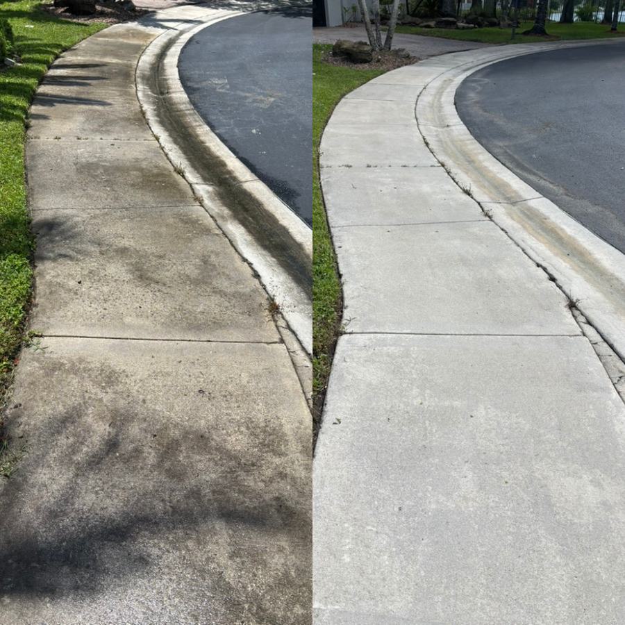 Concrete walkway before and after pressure cleaning